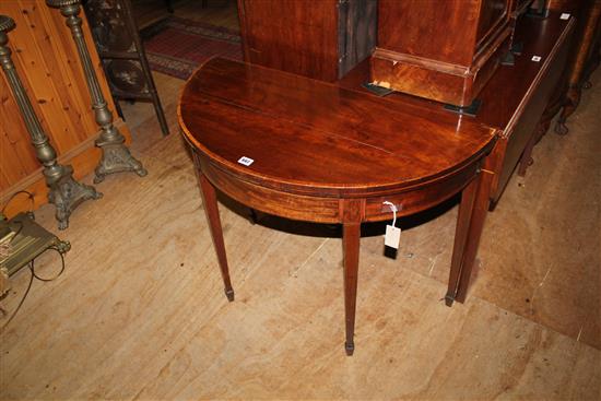 George III mahogany and crossbanded demi lune folding card table, W.3ft(-)